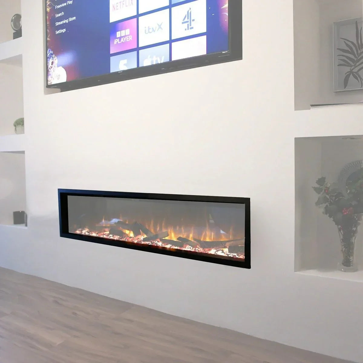 Wall mounted electric fire with realistic flame effect in modern living room setting