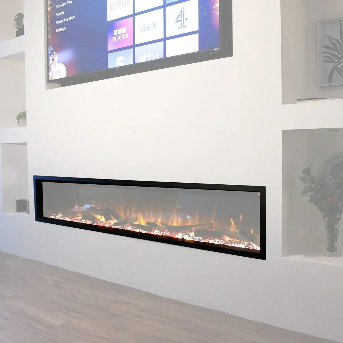 Wall mounted electric fireplace with black frame and log effect in modern living room