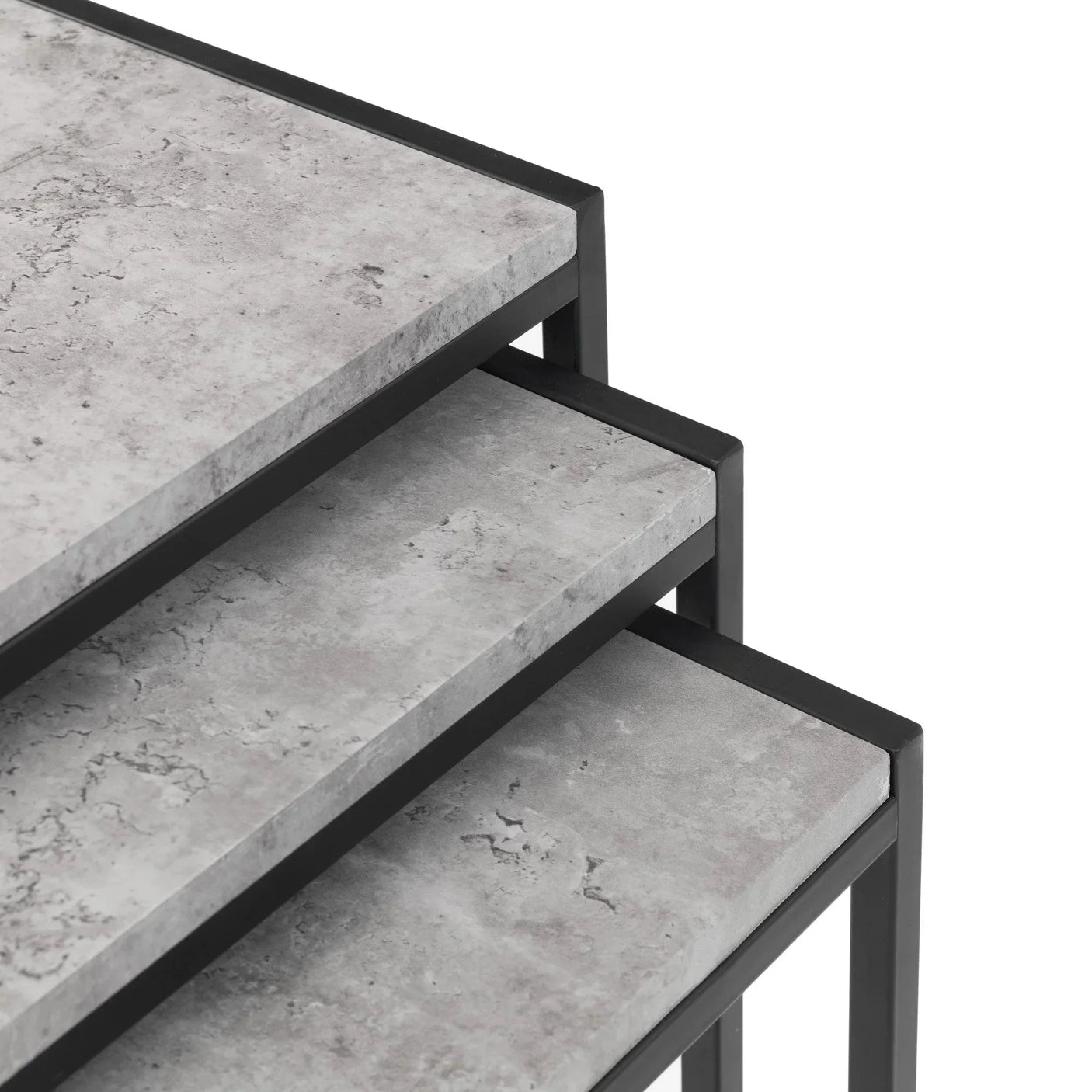 Set of three nesting tables with grey stone effect tops and black metal frames, stacked