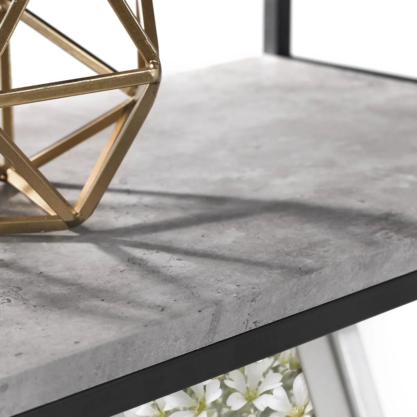 Staten tall bookcase with concrete effect shelf and gold geometric decor