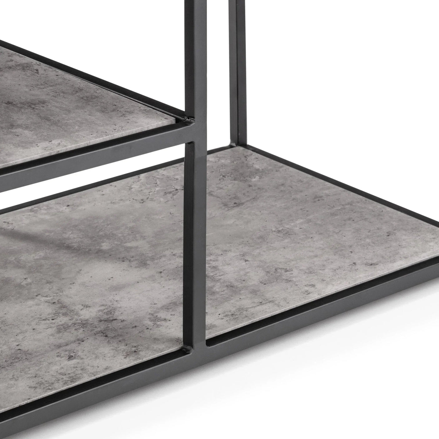 Close view of concrete effect shelving with black metal frame