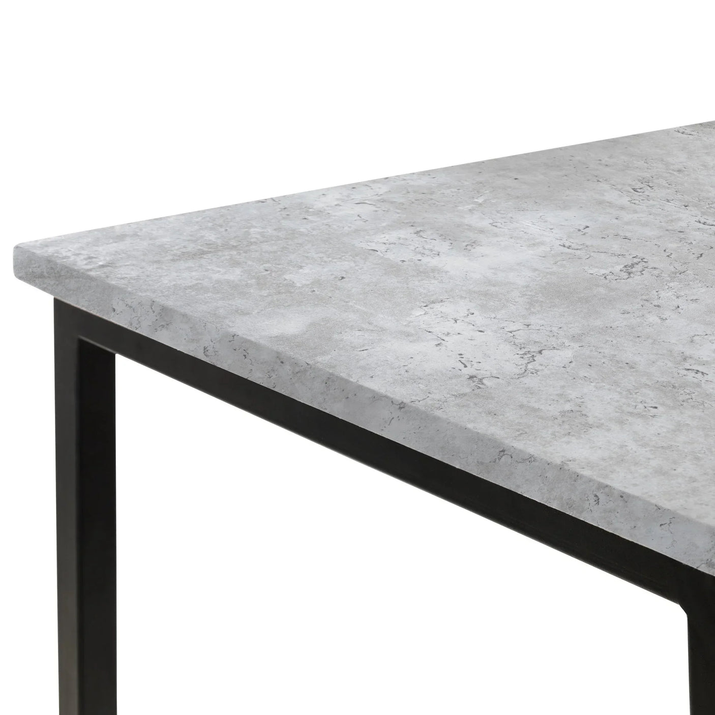 Closeup of modern desk with concrete effect tabletop and black metal frame