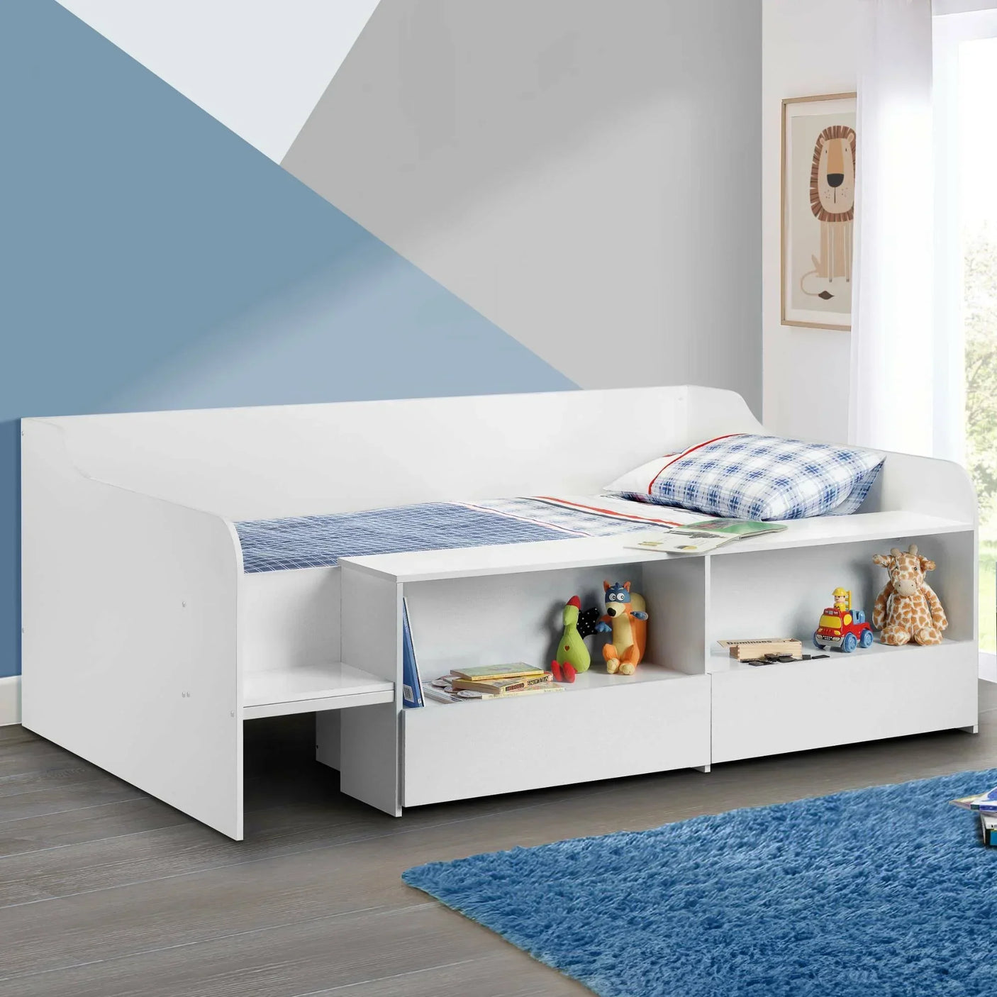 White low sleeper bed with built-in storage shelves in a child's bedroom