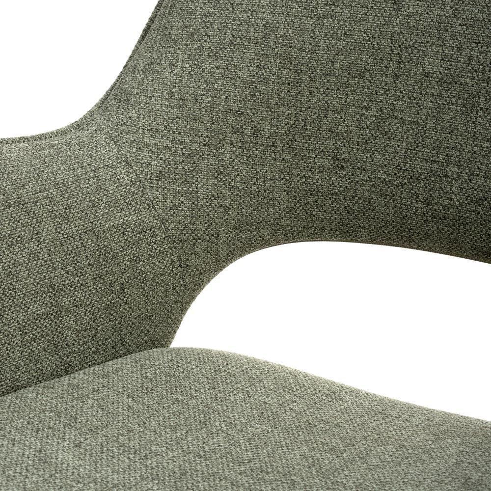 Close-up of green fabric dining chair backrest and seat upholstery