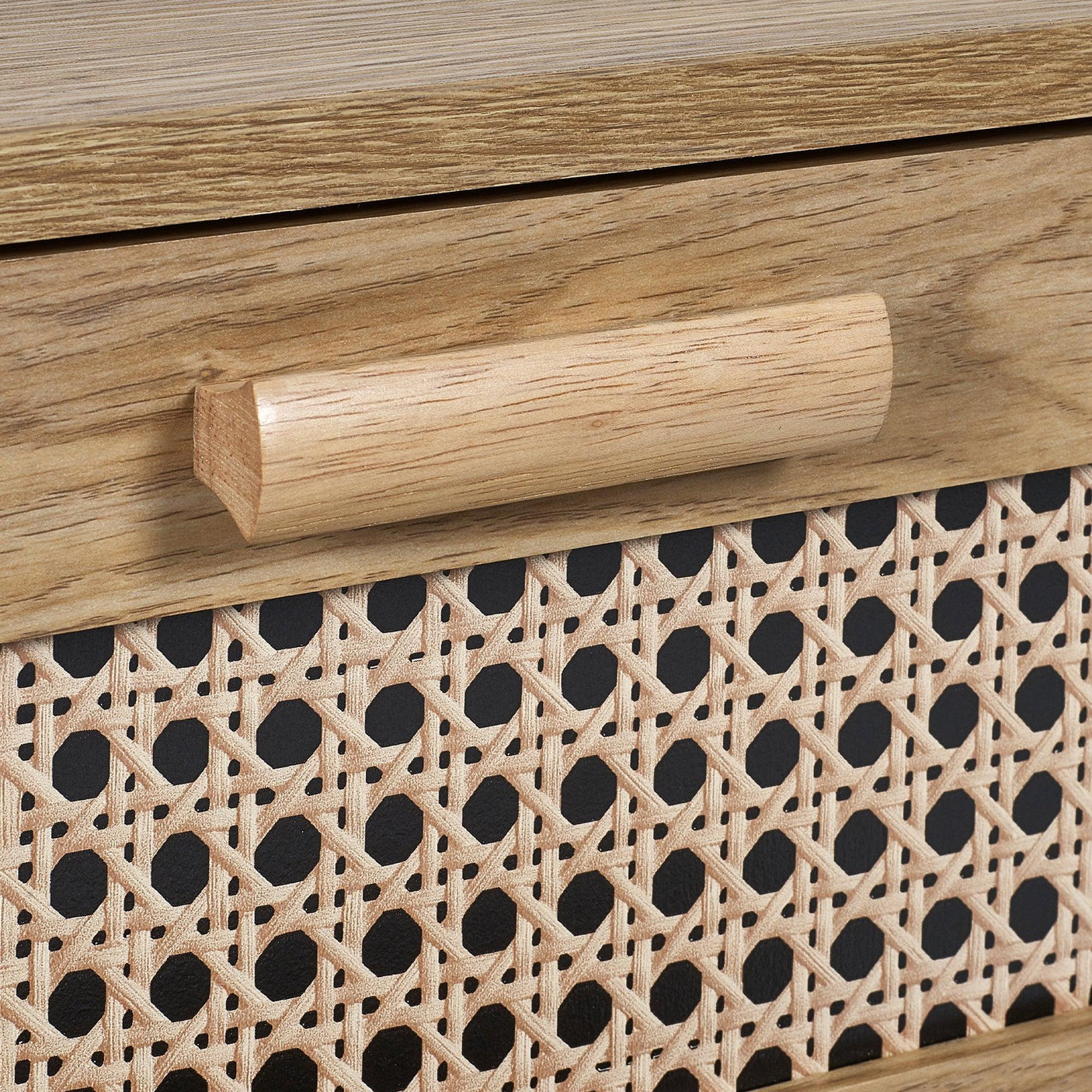Sydney rattan effect bedside table close-up of wood grain and woven drawer front