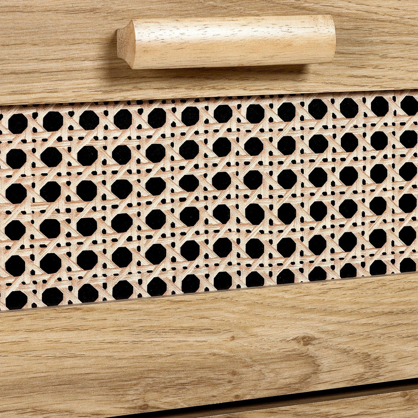 Rattan effect drawer detail with geometric pattern and wooden handle on chest of drawers