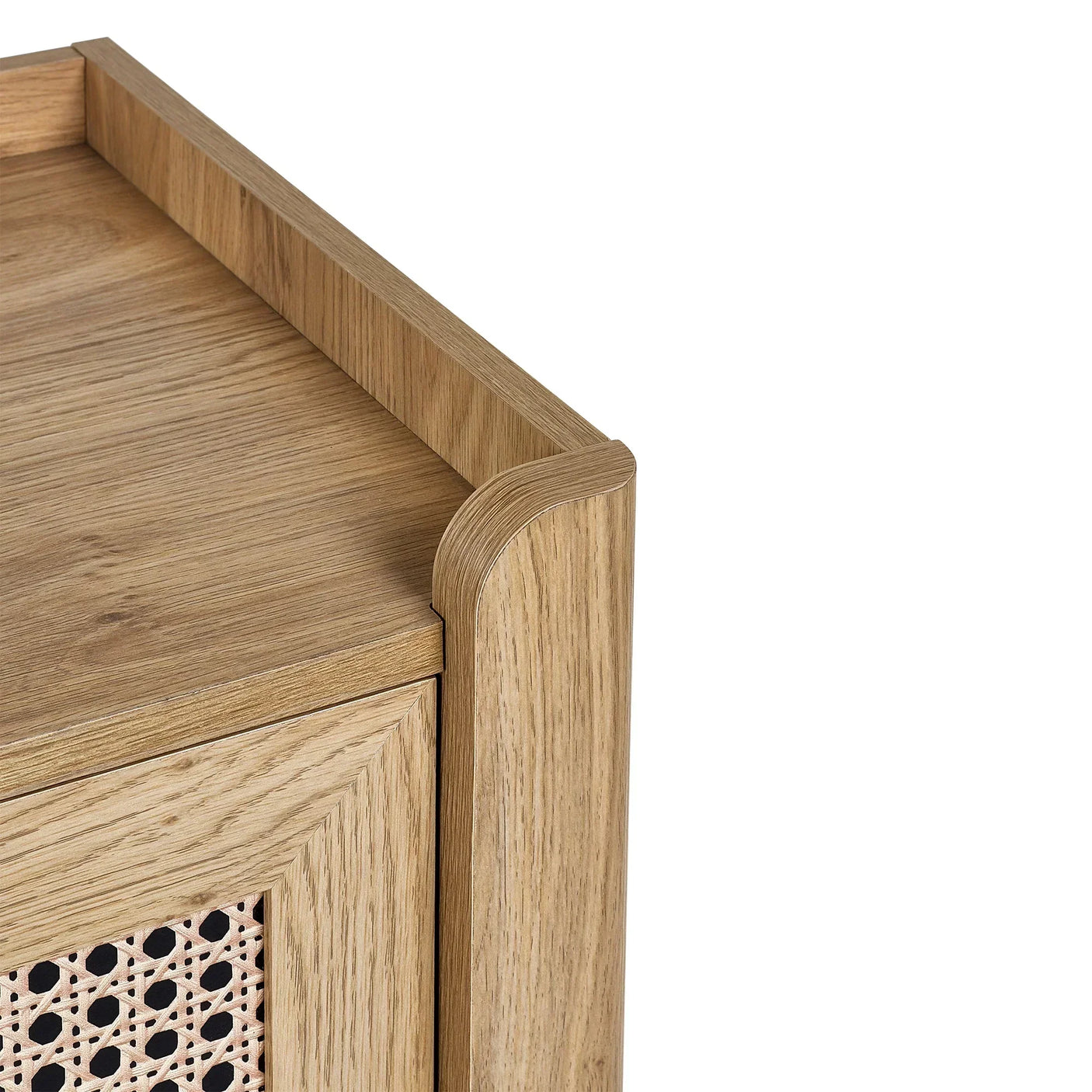 Closeup of rattan effect 3 drawer chest showing wood grain finish and frame detail