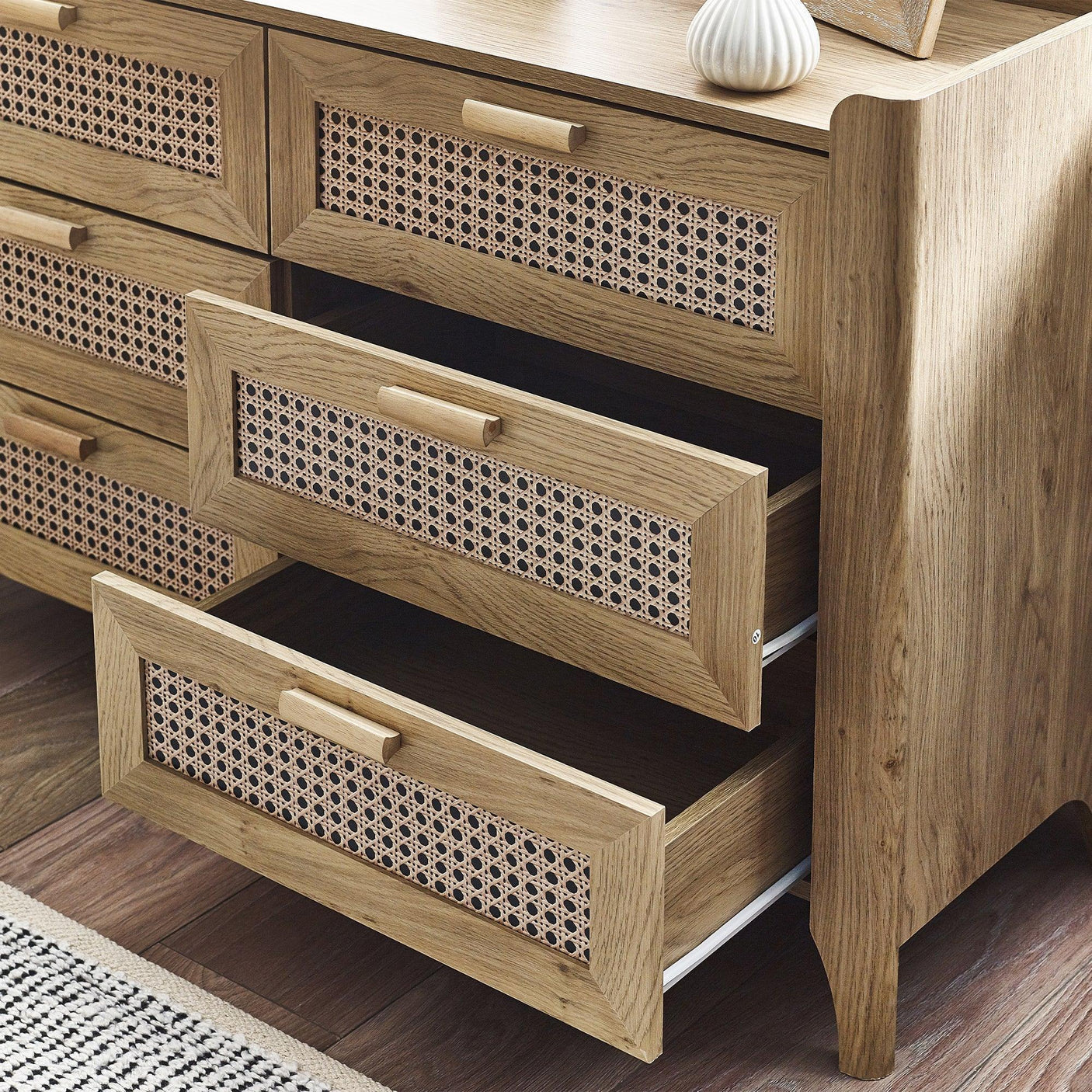 Sydney rattan effect 6 drawer wide chest with open drawers showing woven detail