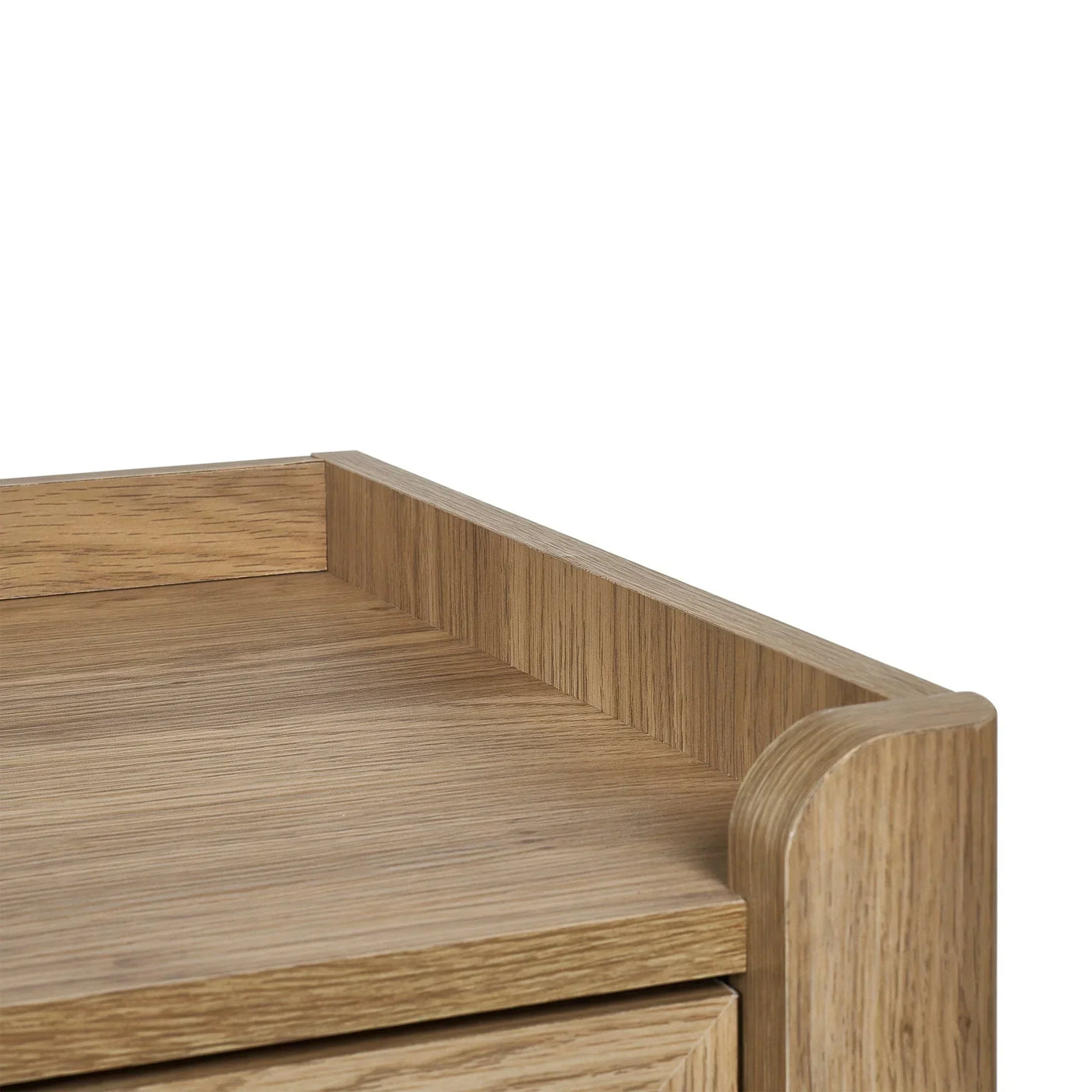 Corner detail of Sydney rattan effect chest with wood grain finish and raised edge