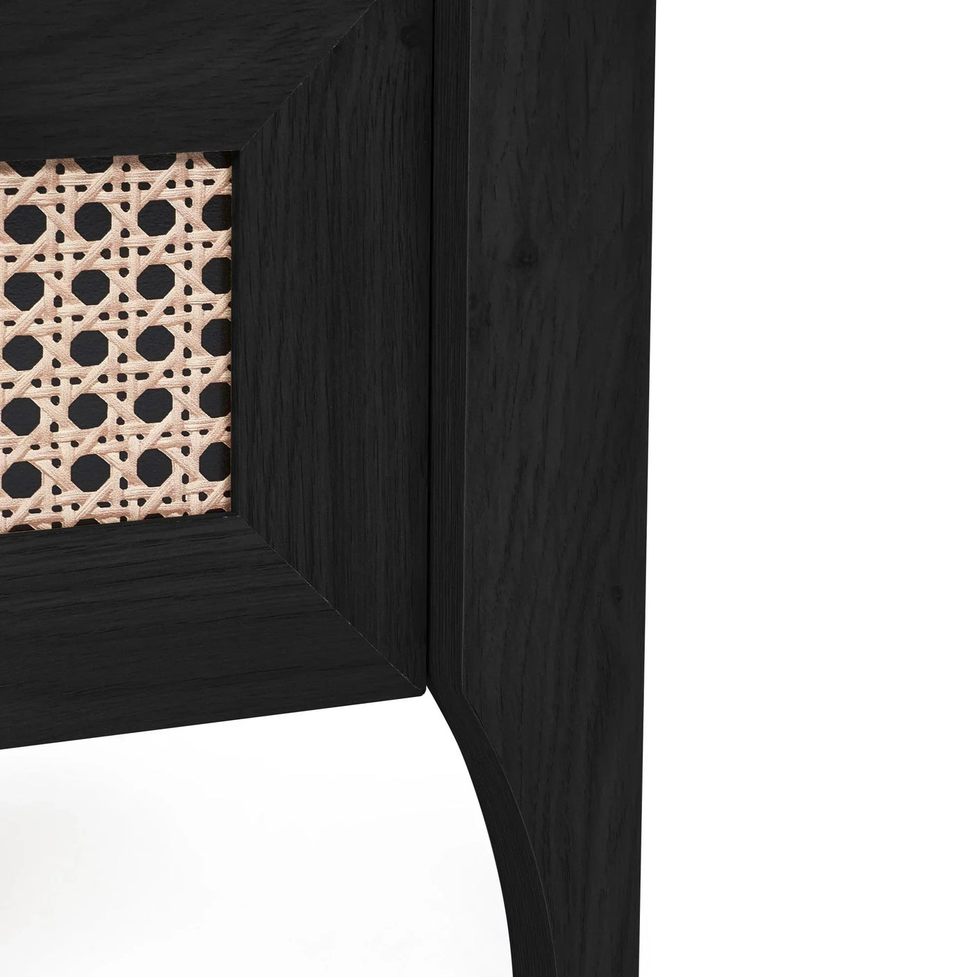 Close-up of Sydney rattan bedside table with black ash wood frame and woven panel detail