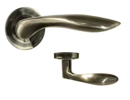 Brushed brass door handle set with round rose, shown from top and side view