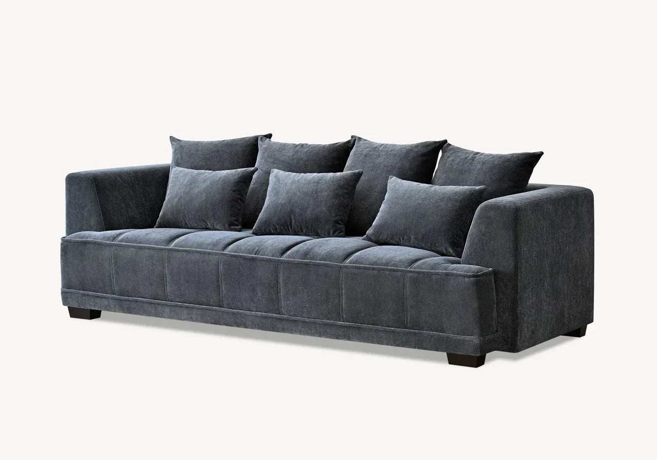 Dark grey fabric sofa with plush seat and six matching scatter cushions