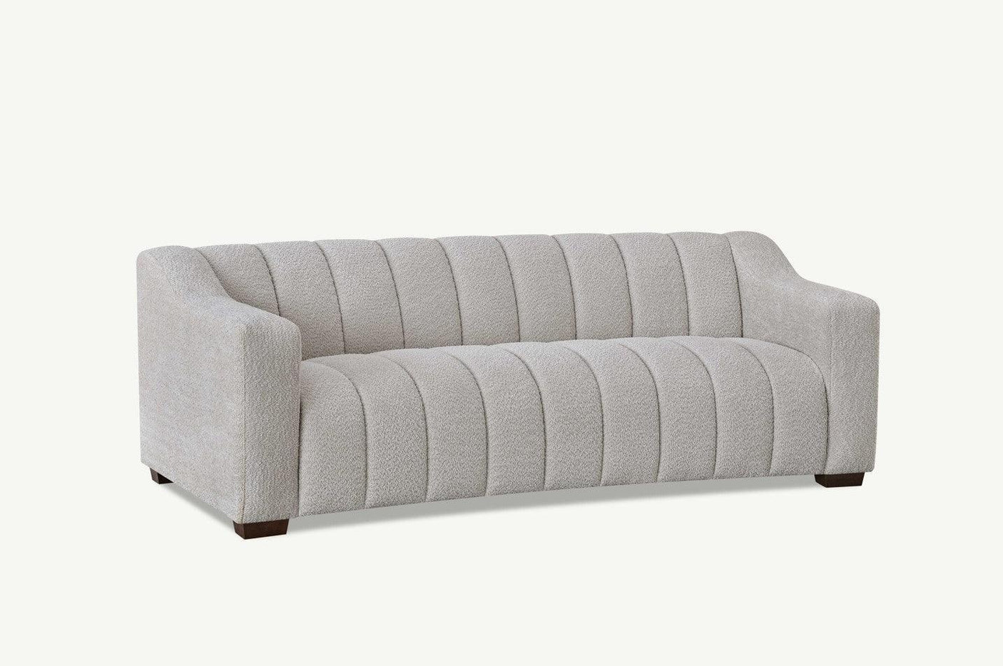 Light grey fabric sofa with vertical channel tufting and wooden legs, front angle view