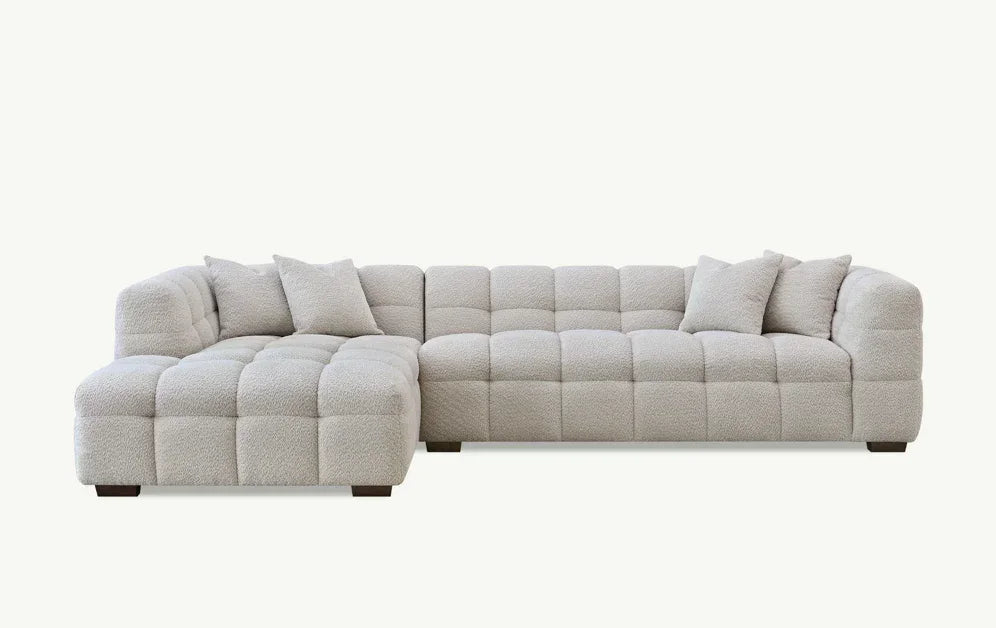Light grey corner sofa with textured upholstery and square tufted design, 4 scatter cushions