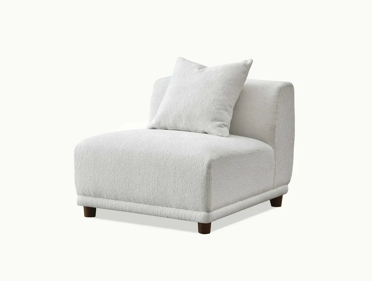 Modern armless accent chair in light fabric with matching cushion and dark wooden legs