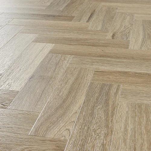 oak herringbone laminate flooring with natural wood grain pattern close-up perspective