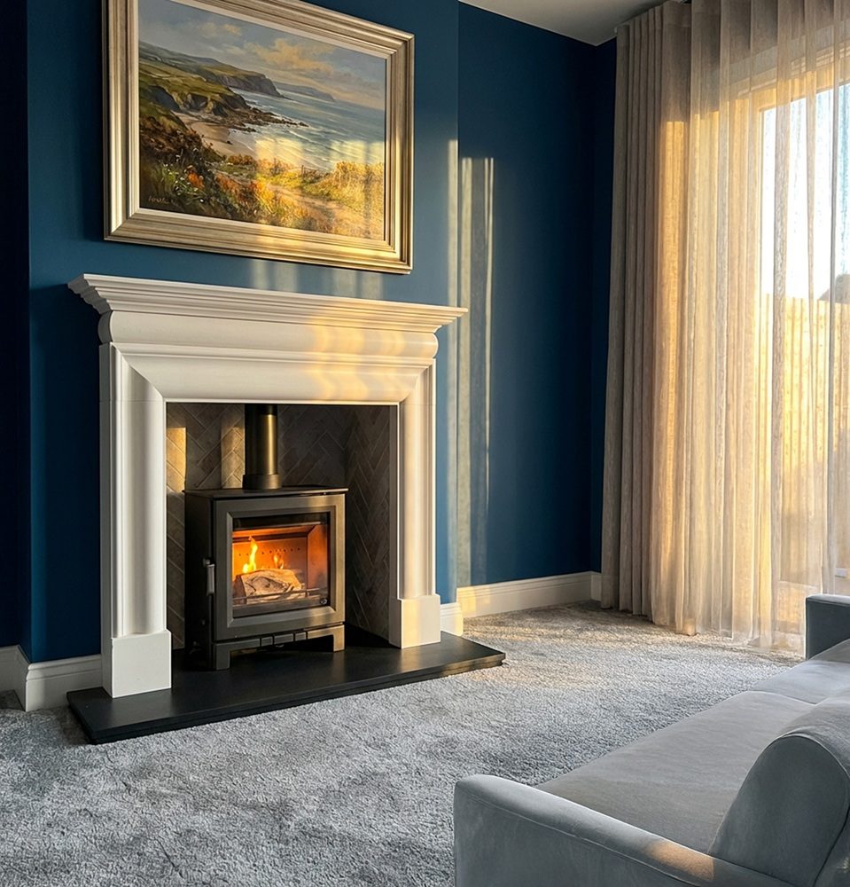 Mourne Summit 8 Stove burning brightly in a modern living room setting