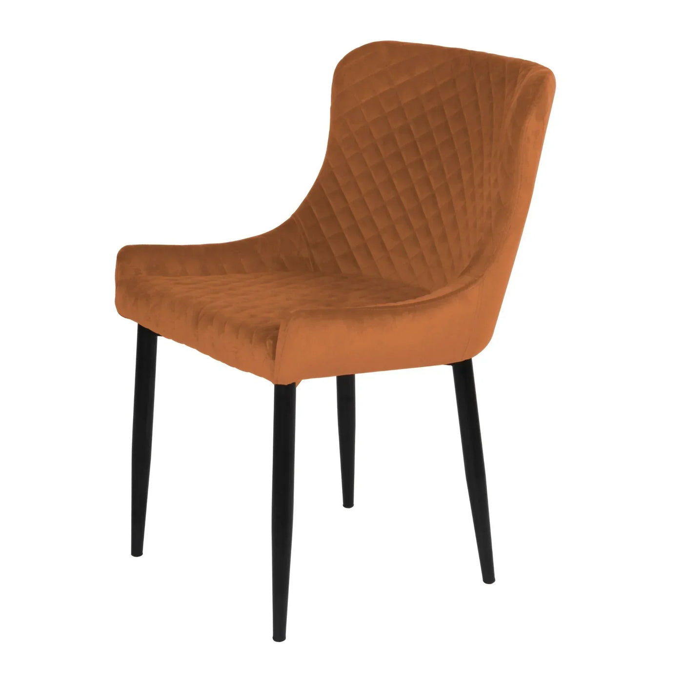 Rust velvet dining chair with quilted backrest and black metal legs, angled side view