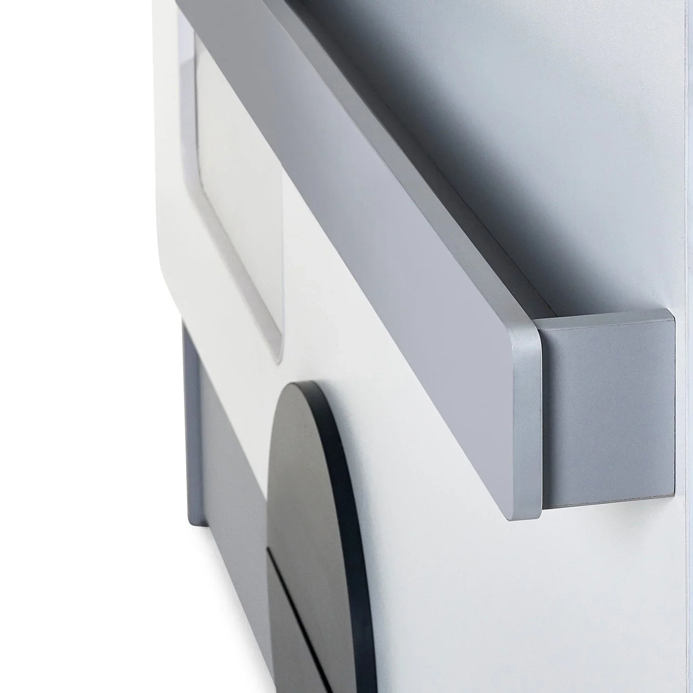 Close-up of Tourer caravan bed grey safety rail and side panel design