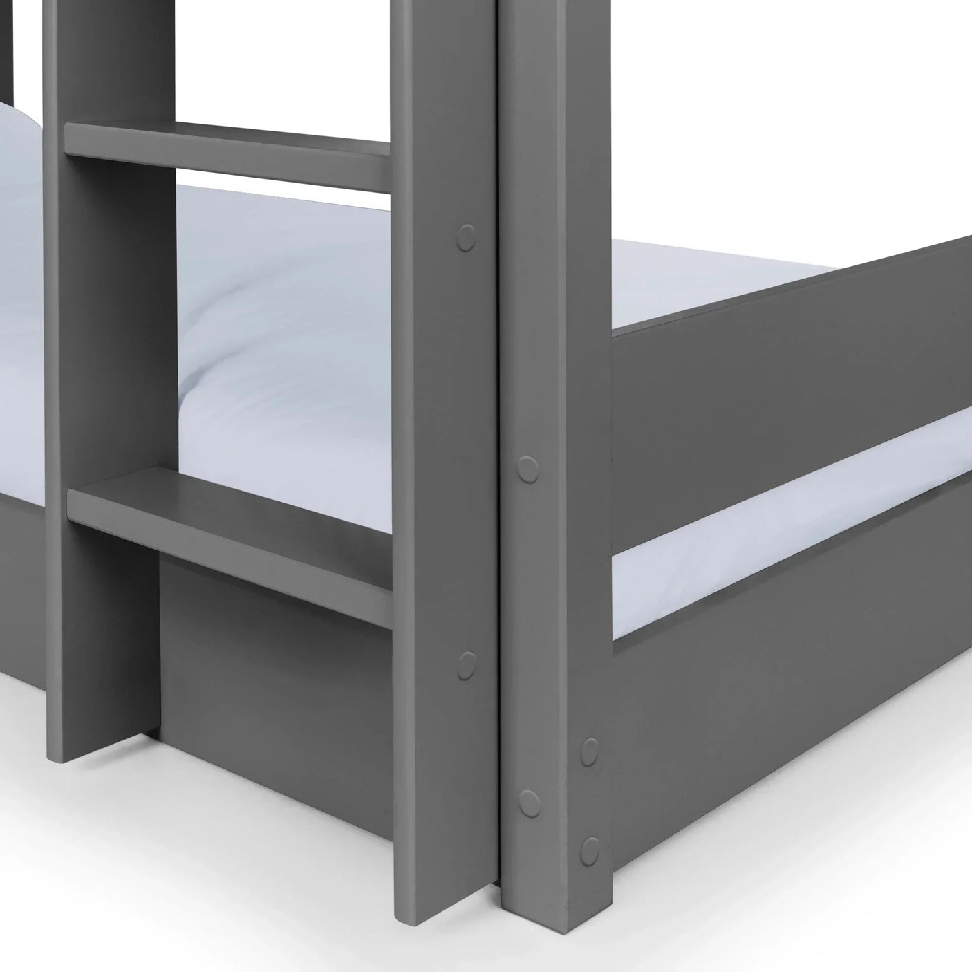 Grey wooden bunk bed corner with ladder and white bedding