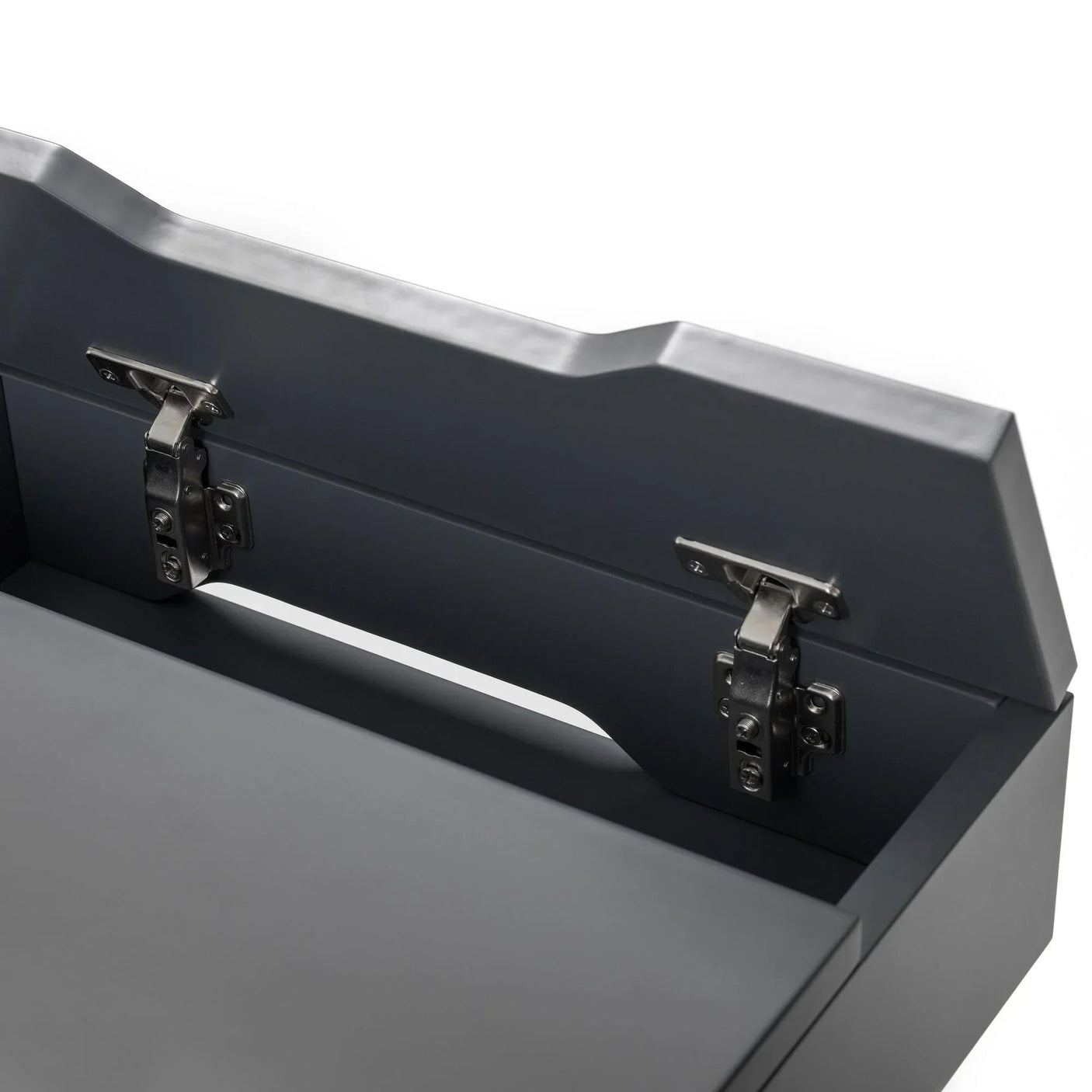 Trianon grey desk close-up showing hinged storage compartment and matte finish