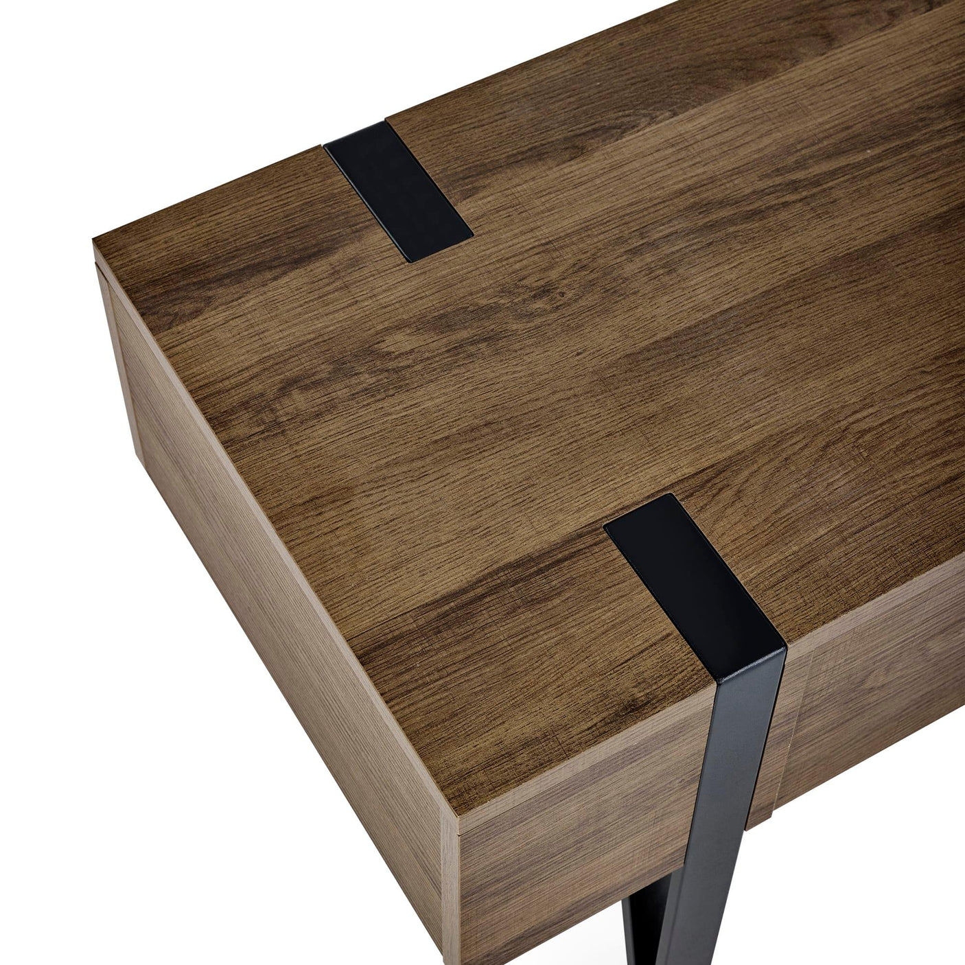 Close view of wooden desk with black metal leg accents and natural grain finish