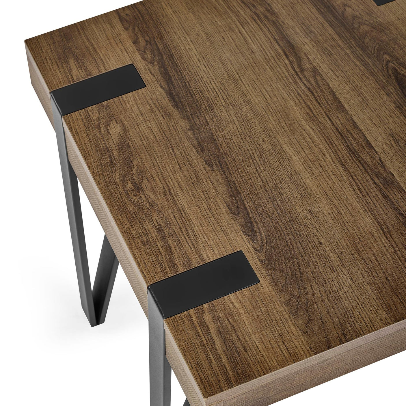 Modern wood dining table with metal legs and black corner brackets, angled view