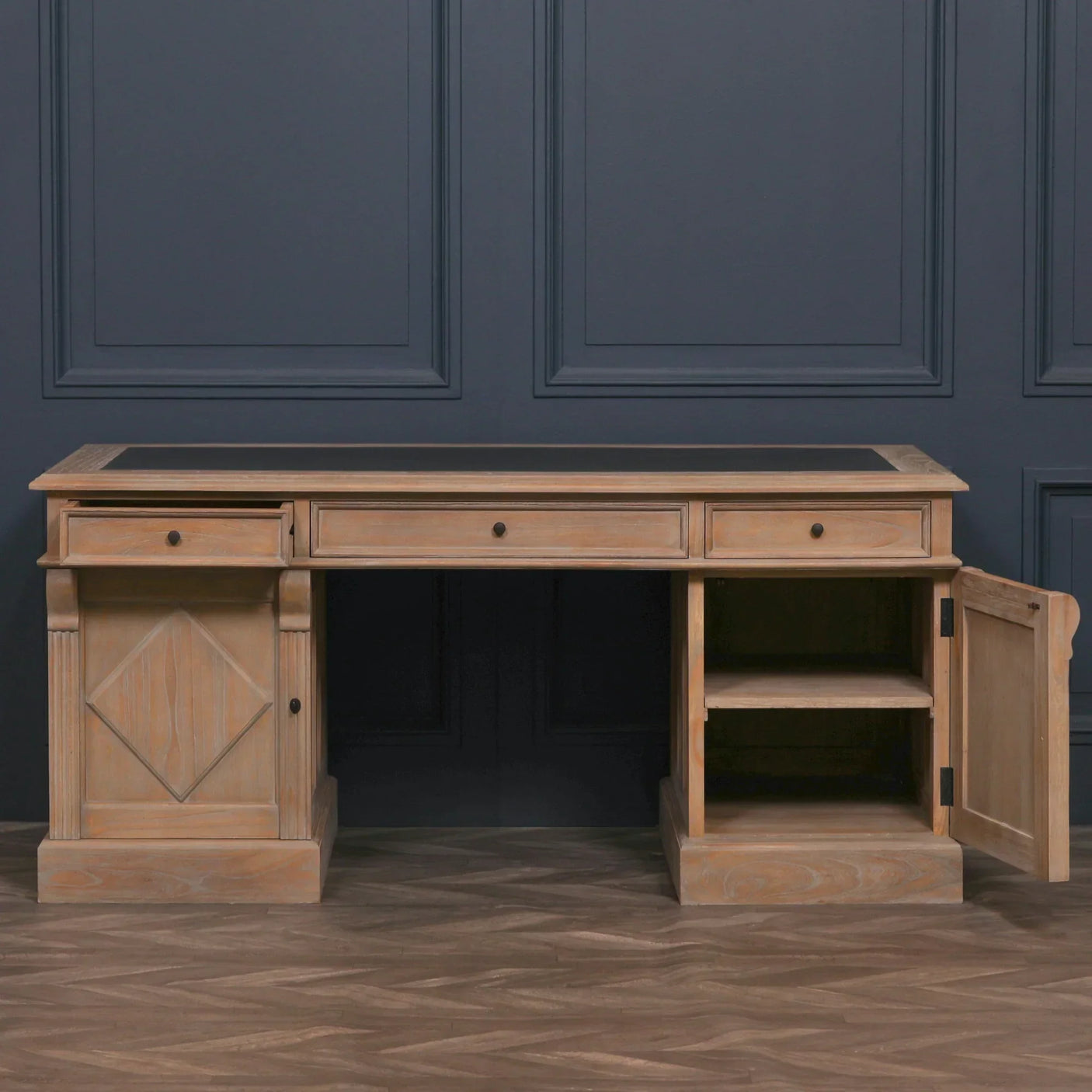 Wooden office desk with three drawers, paneled doors, and open shelving on right side