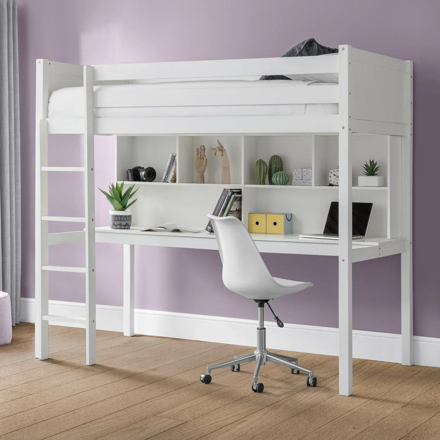 White highsleeper bed with built-in desk and shelving, modern chair, and workspace decor