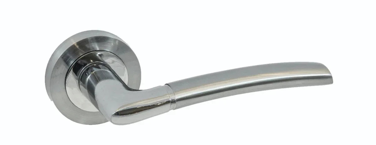 Satin chrome lever door handle with round rose, close-up side view