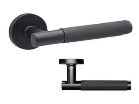 Matte black door handle set with modern round rose, shown from side and front angles