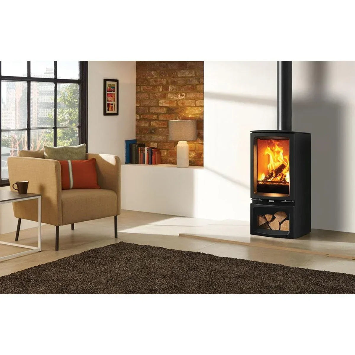 Wood burning stove in modern living room with armchair and brick wall feature