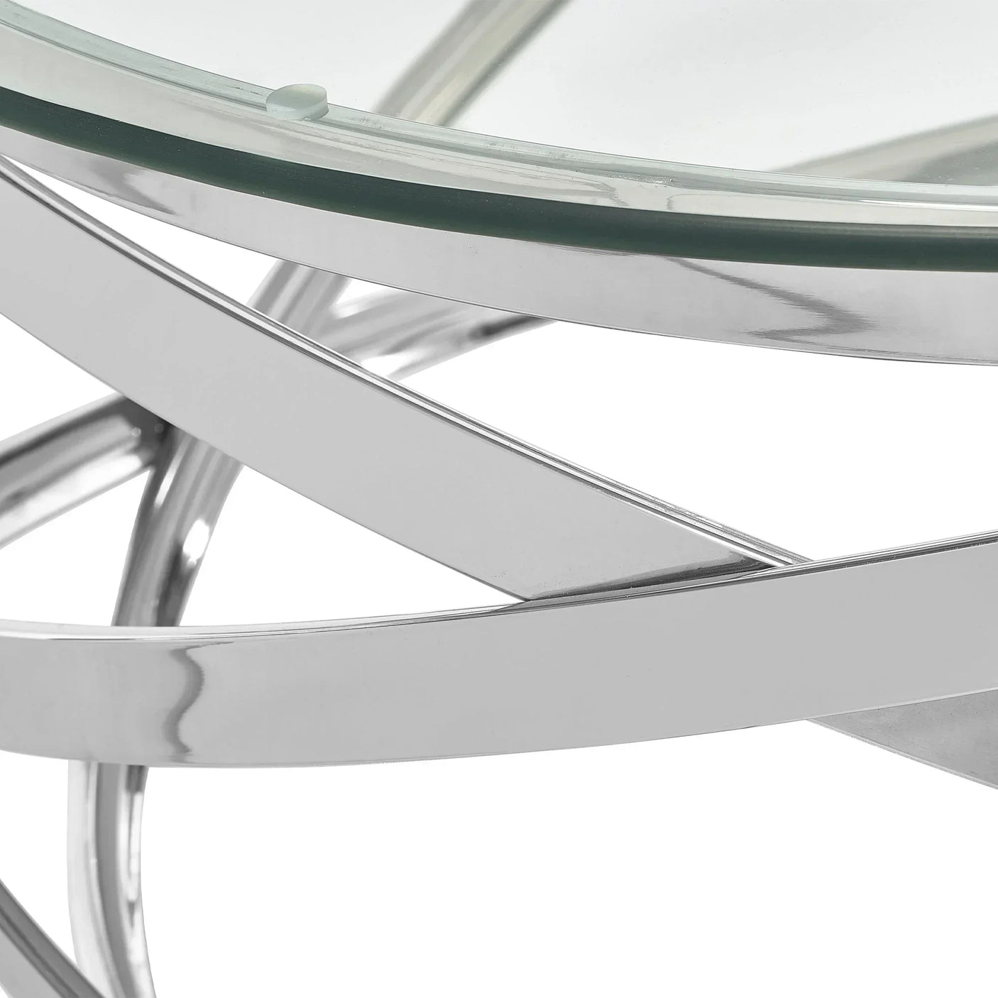 Chrome coffee table base with intersecting metal bands and round glass top detail