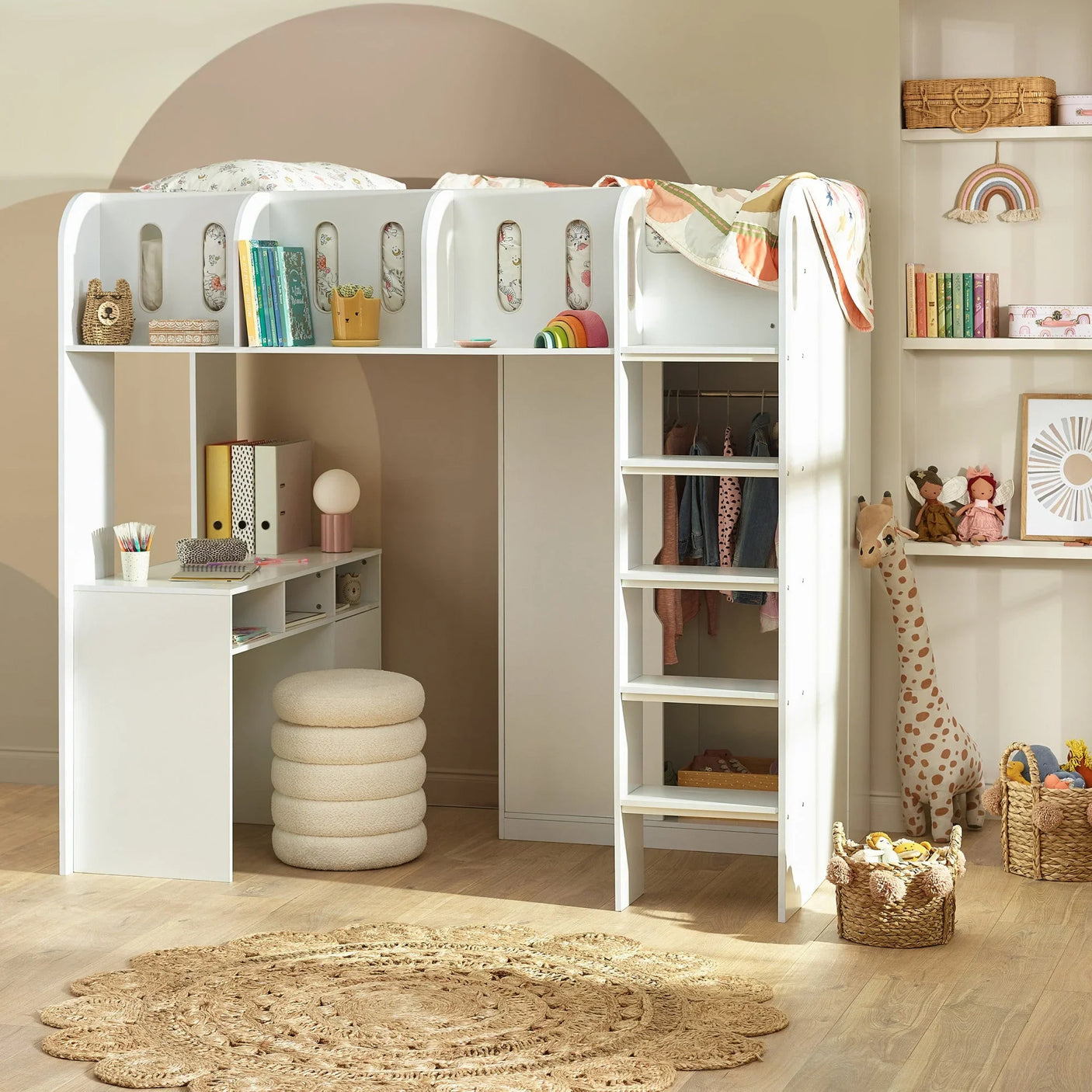White kids' loft bed with ladder, desk, storage shelves, and wardrobe in a nursery