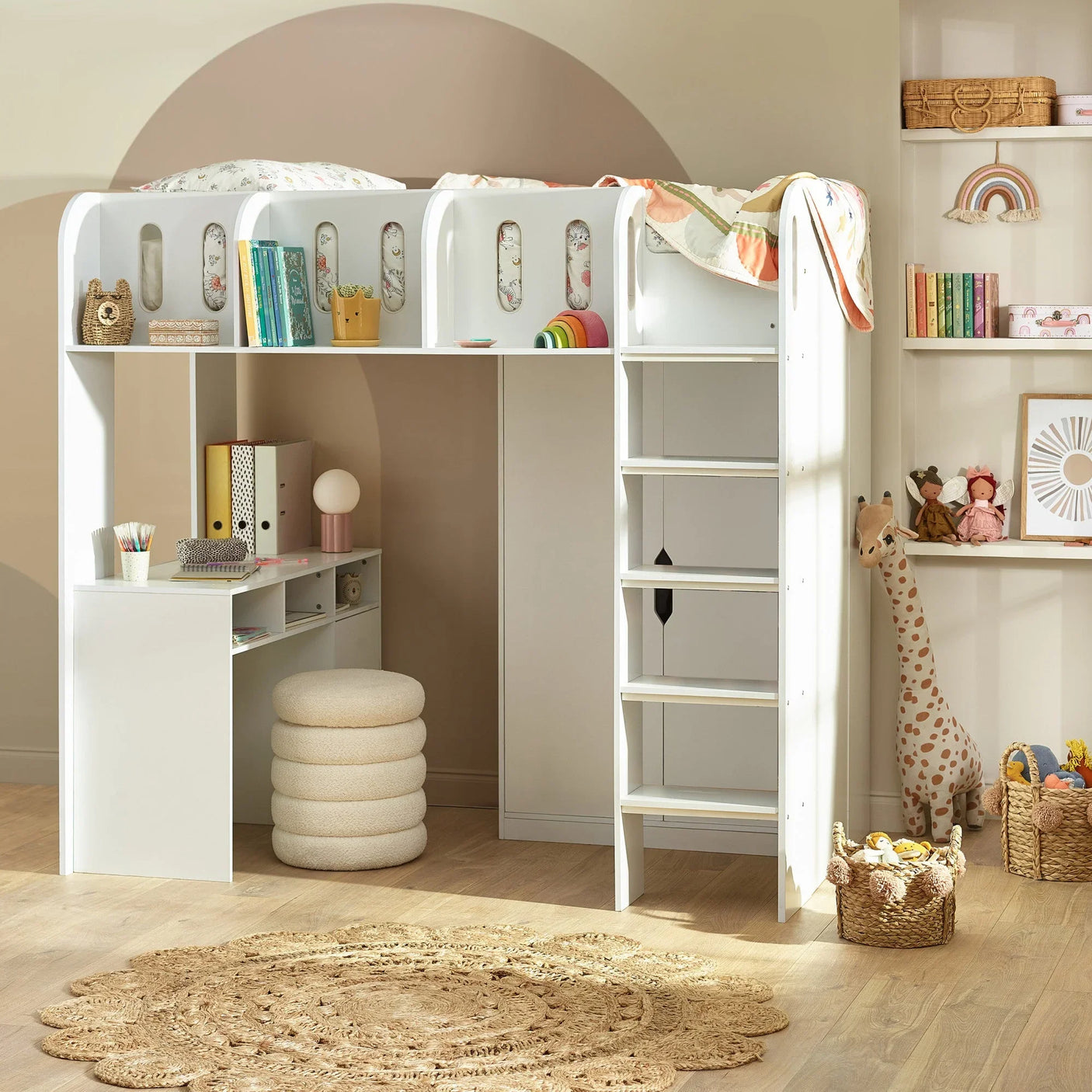 White kids’ loft bed with built-in desk, ladder, and storage shelves in a neutral bedroom
