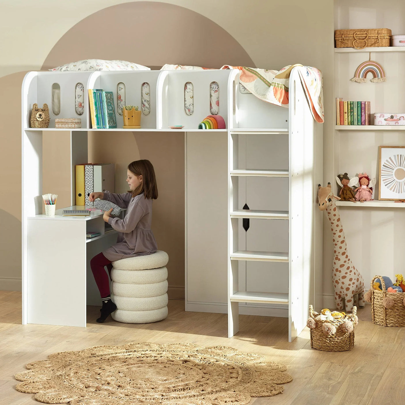 White kids' loft bed with built-in desk, ladder, and shelving in a modern bedroom
