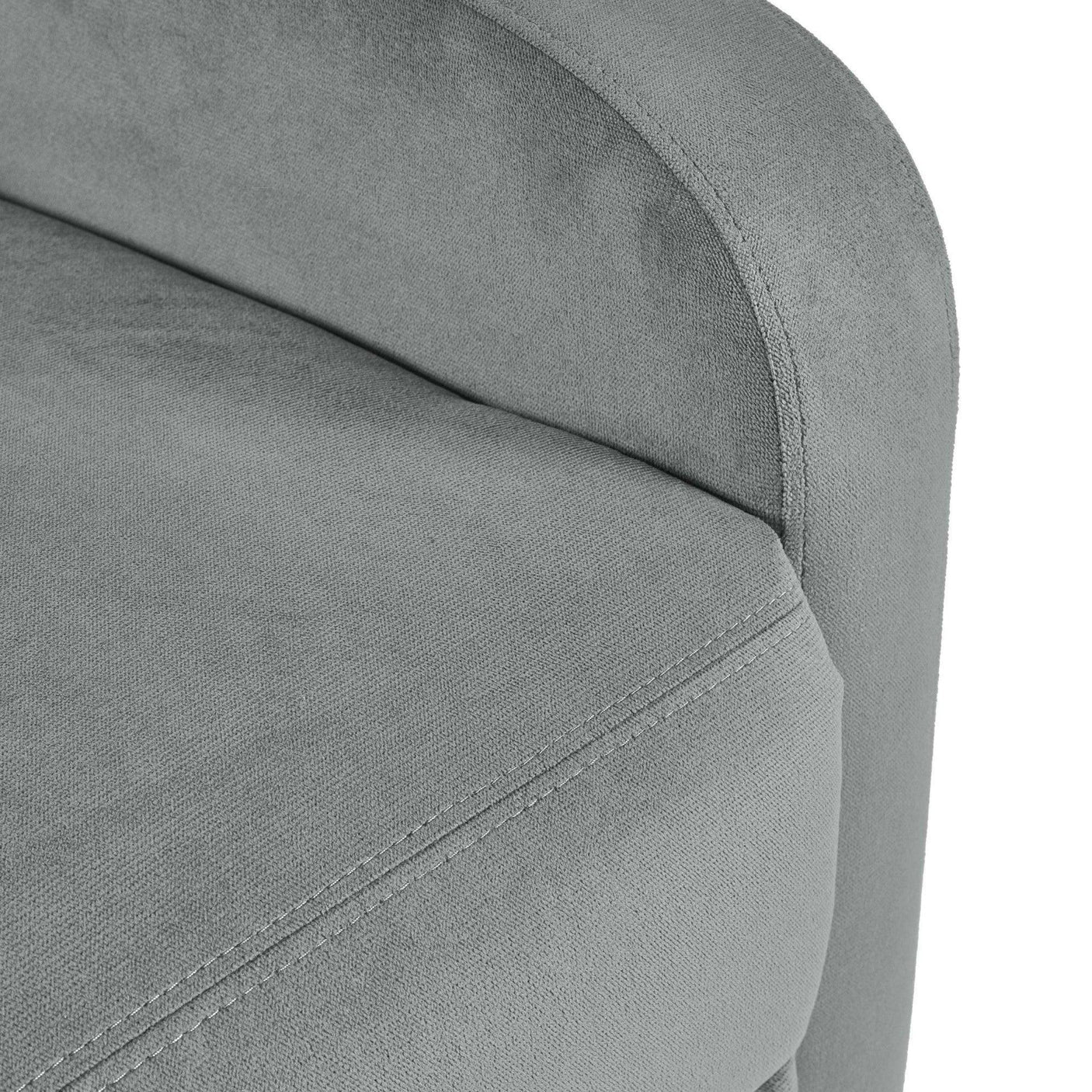 Light grey fabric sofa arm detail with visible stitching