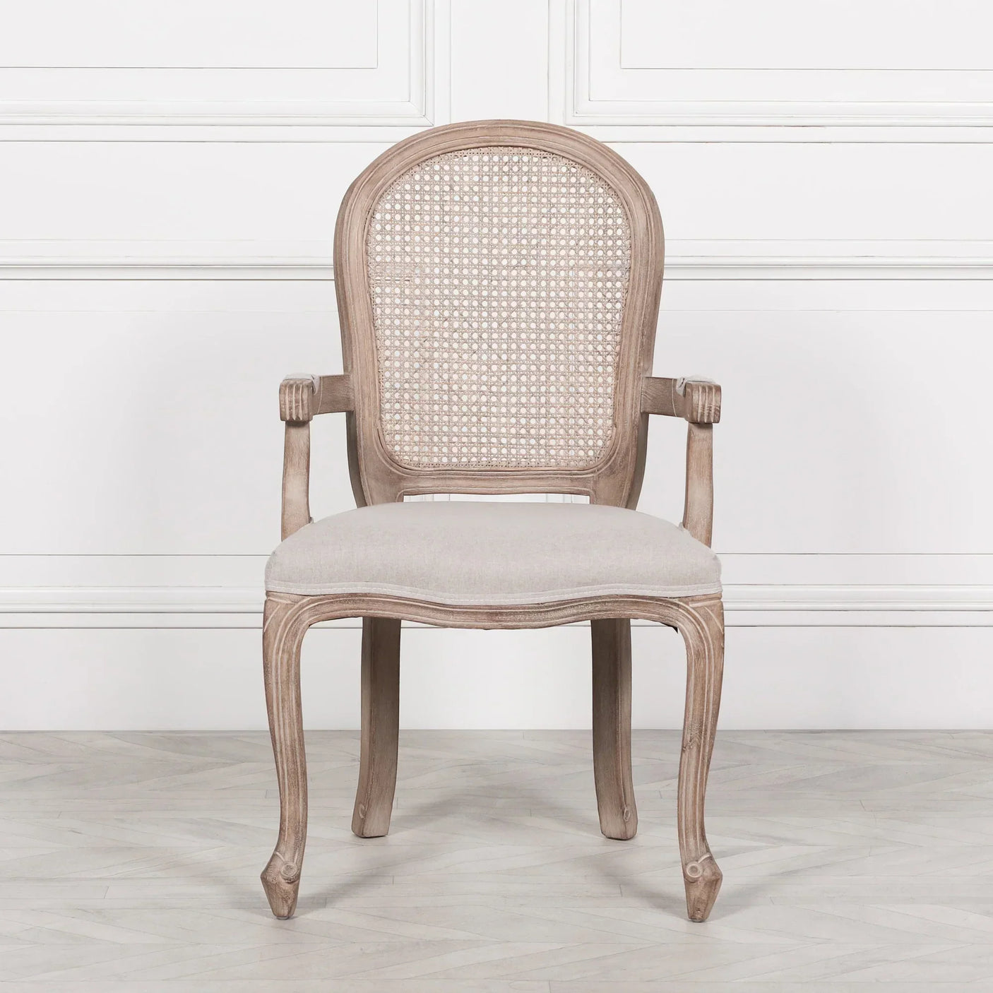 Wooden dining chair with beige upholstered seat and cane backrest in classic style