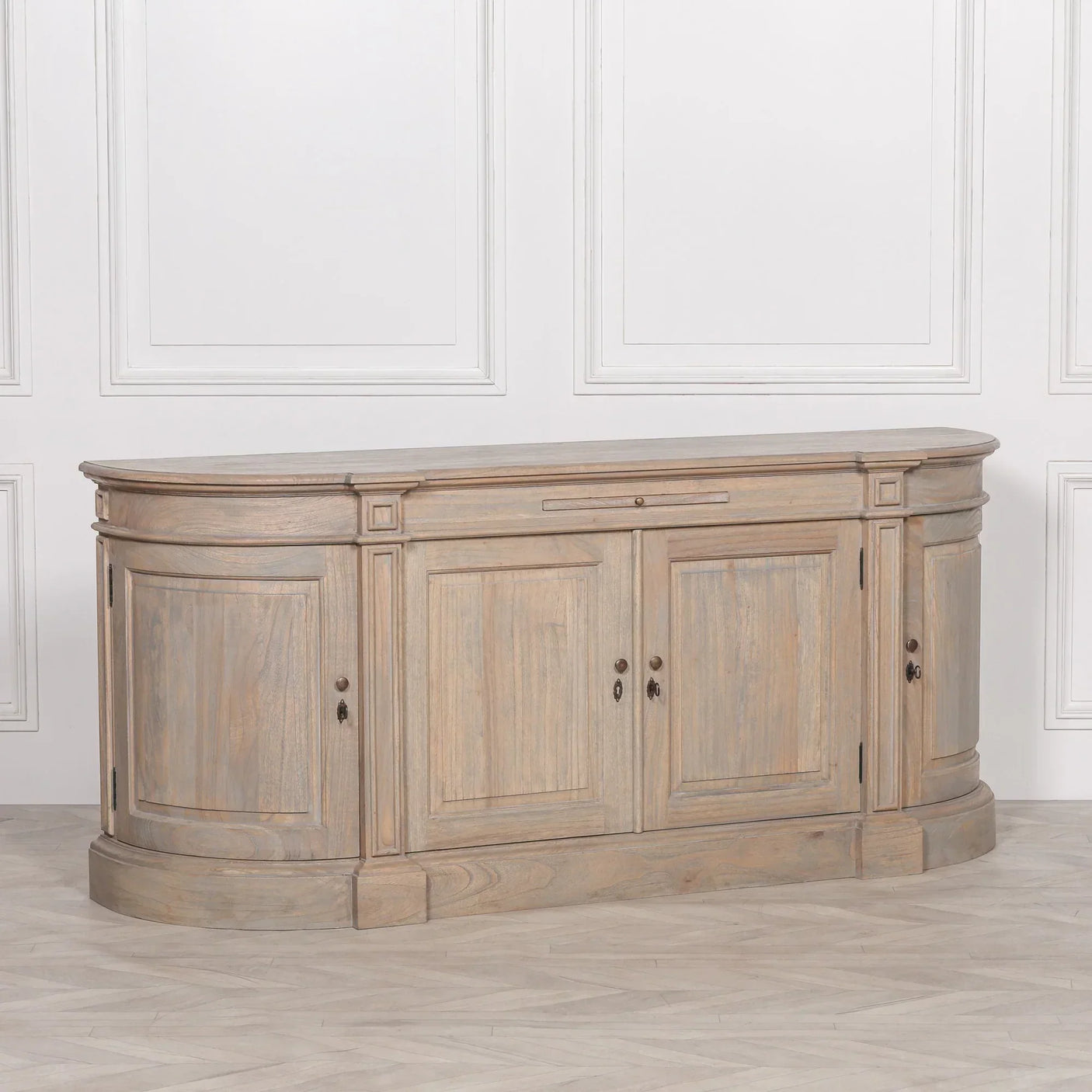 Light oak curved sideboard cabinet with paneled doors and classic detailing