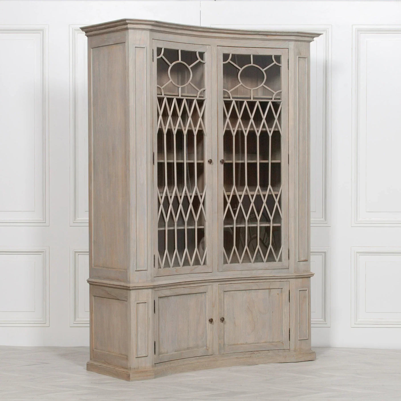 Wooden display cabinet with glass lattice doors and lower storage cupboards