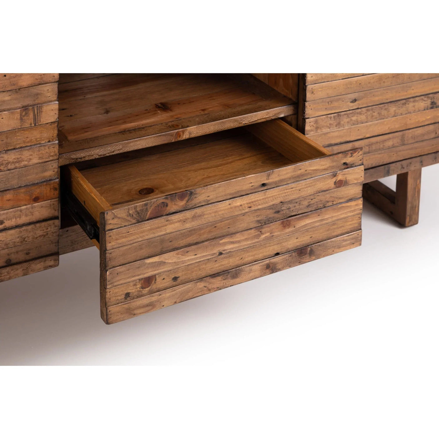 Rustic wood sideboard closeup showing open drawer and natural grain detail