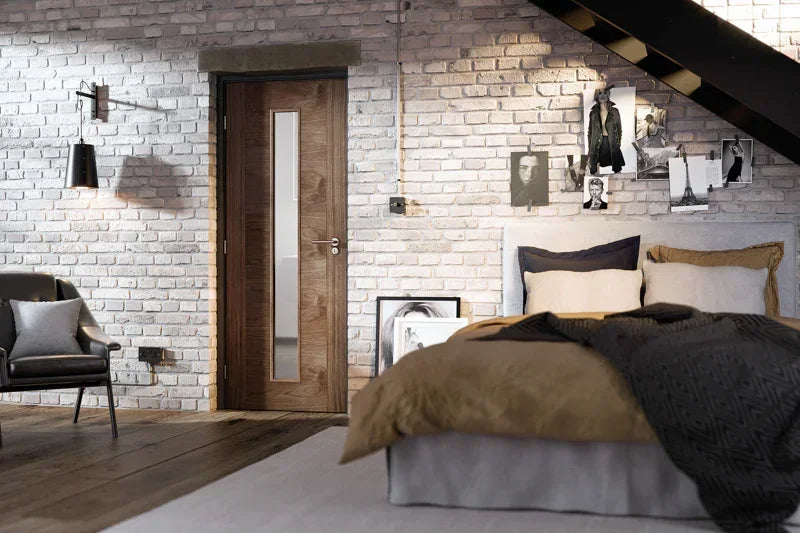 walnut Sofia glazed door with vertical glass panel in modern loft bedroom with brick walls