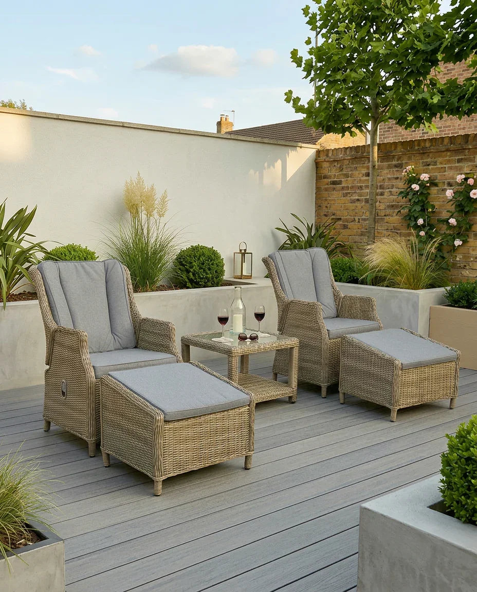 Wentworth recliner chair set with footstools and grey cushions on a modern patio
