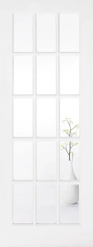 White glazed internal door with 15 glass panels, vase with branches visible through lower pane