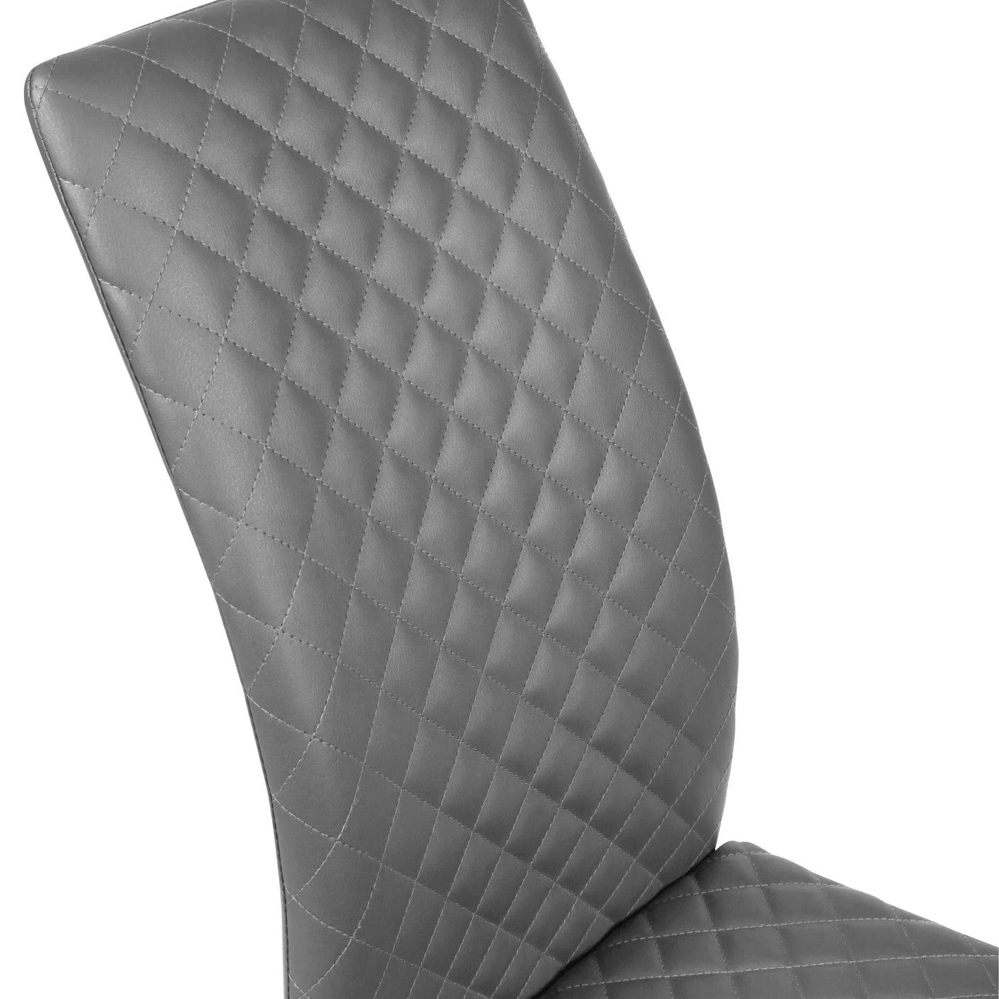 Grey dining chair with diamond stitched faux leather upholstery, angled backrest detail