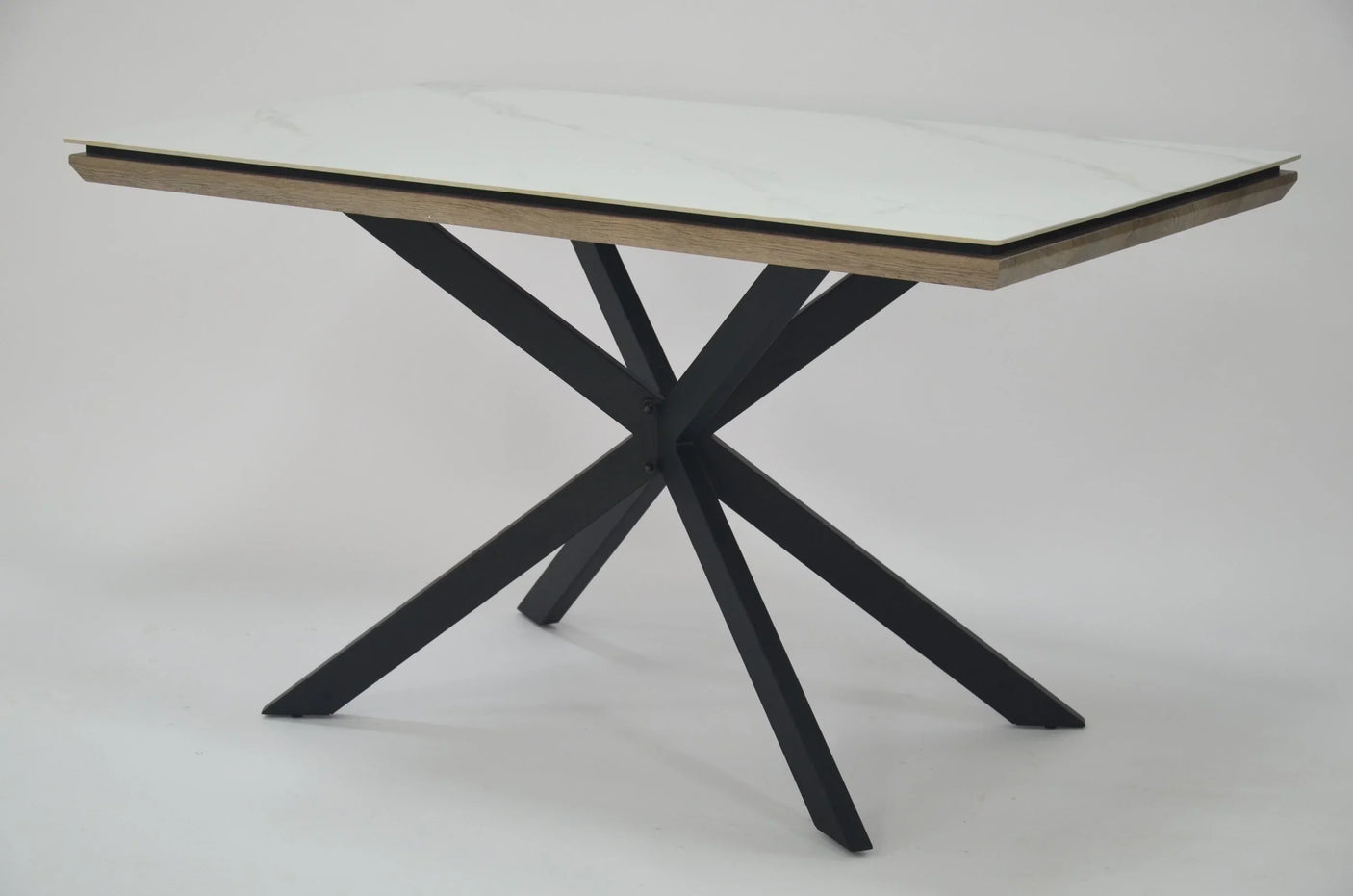 Rectangular dining table with white marble-effect top and black metal crossed legs