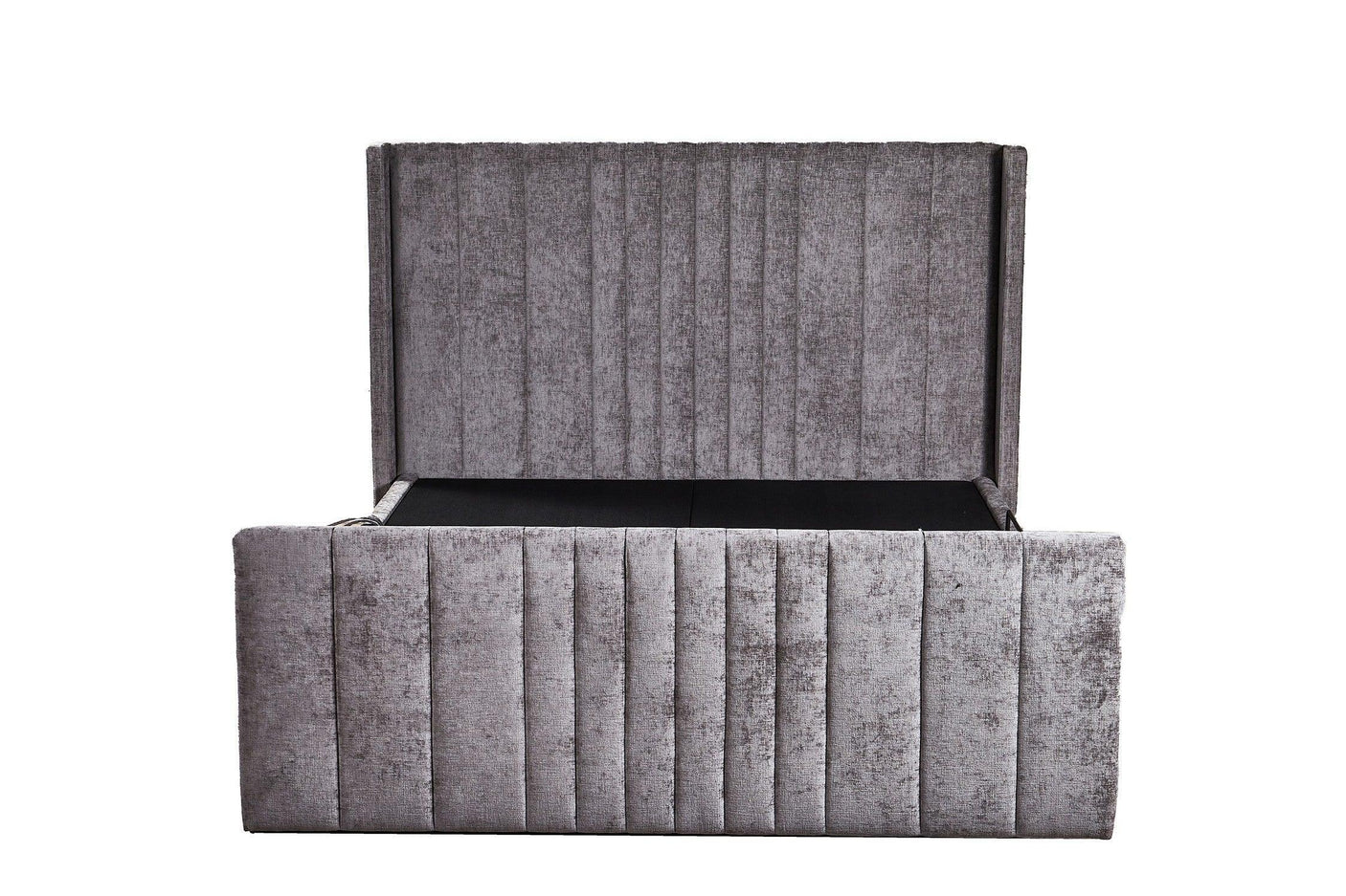 Grey upholstered storage bed frame with vertical panel detailing and open ottoman base