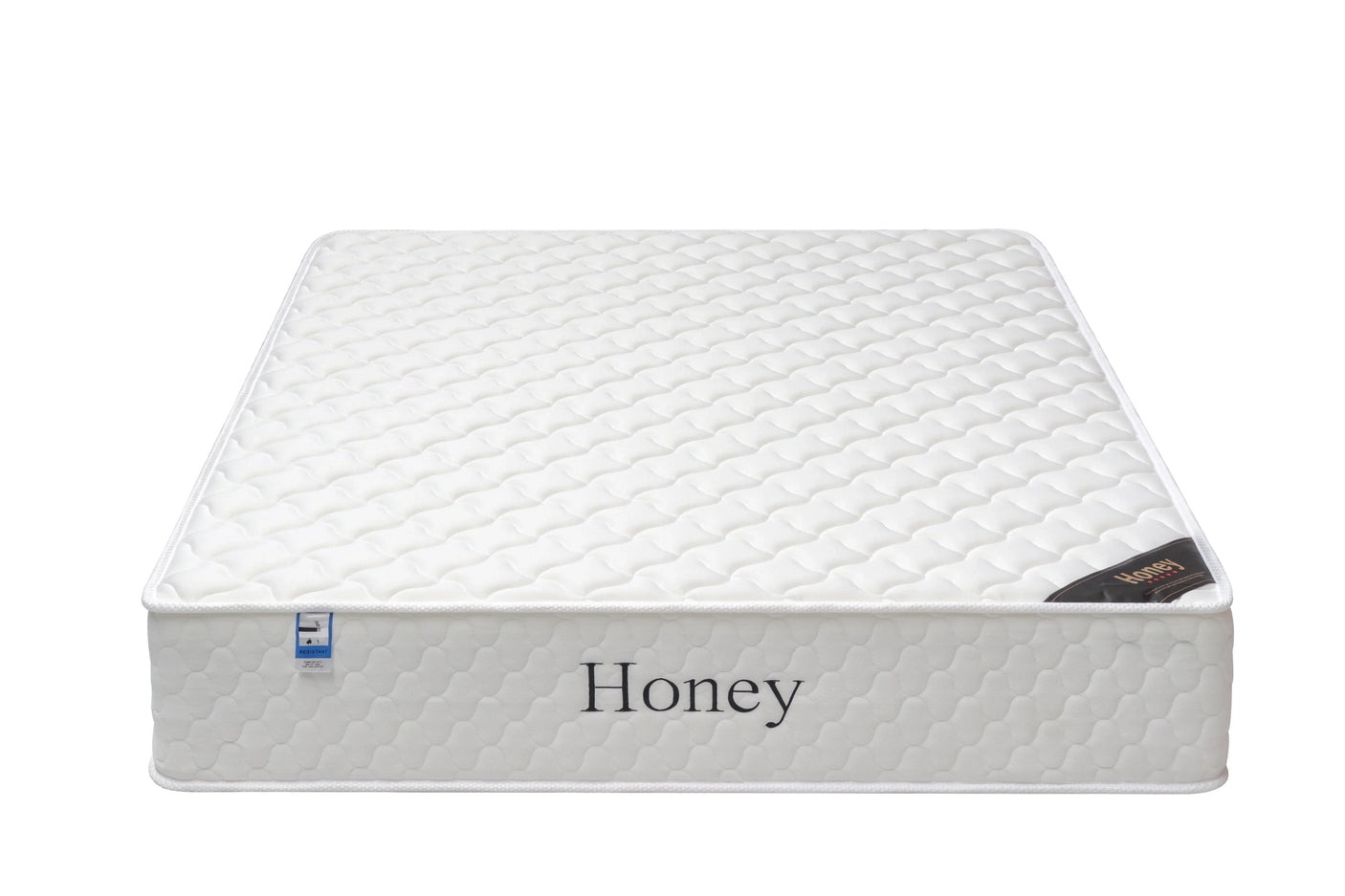 White honey mattress with quilted pattern and side label, front angle view