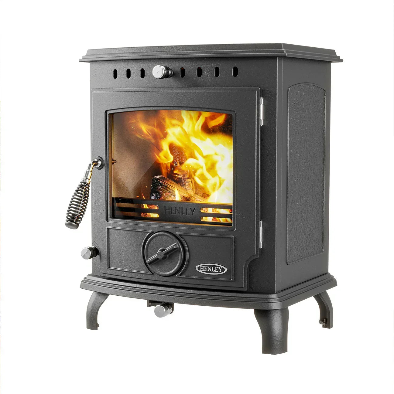 Black cast iron wood burning stove with fire visible through front glass panel