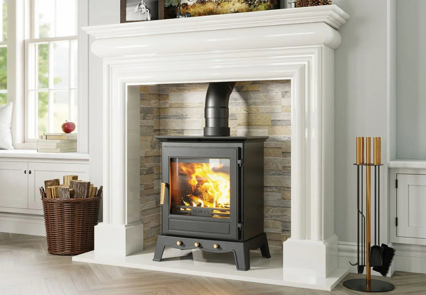 Black wood burning stove with visible fire, set in stone fireplace surround, modern living room